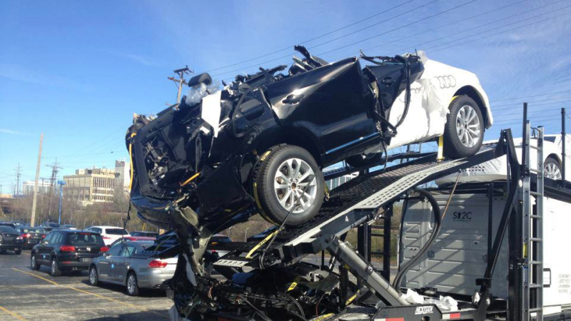 Illustration for article titled This Is What Happens When A Car Carrier Hits The Bottom Of A Bridge